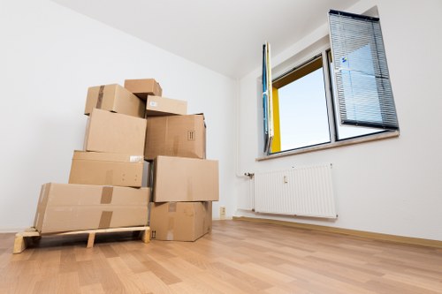 Careful packing and loading of student belongings for transport