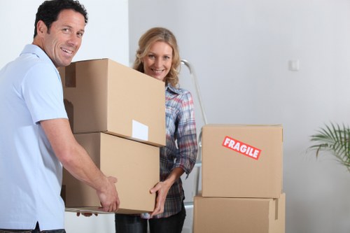 Packed boxes and furniture ready for apartment removals in Maida Vale